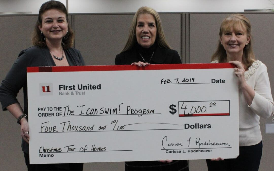 Giant check for $4,000 made out to The "I can swim!" Program.