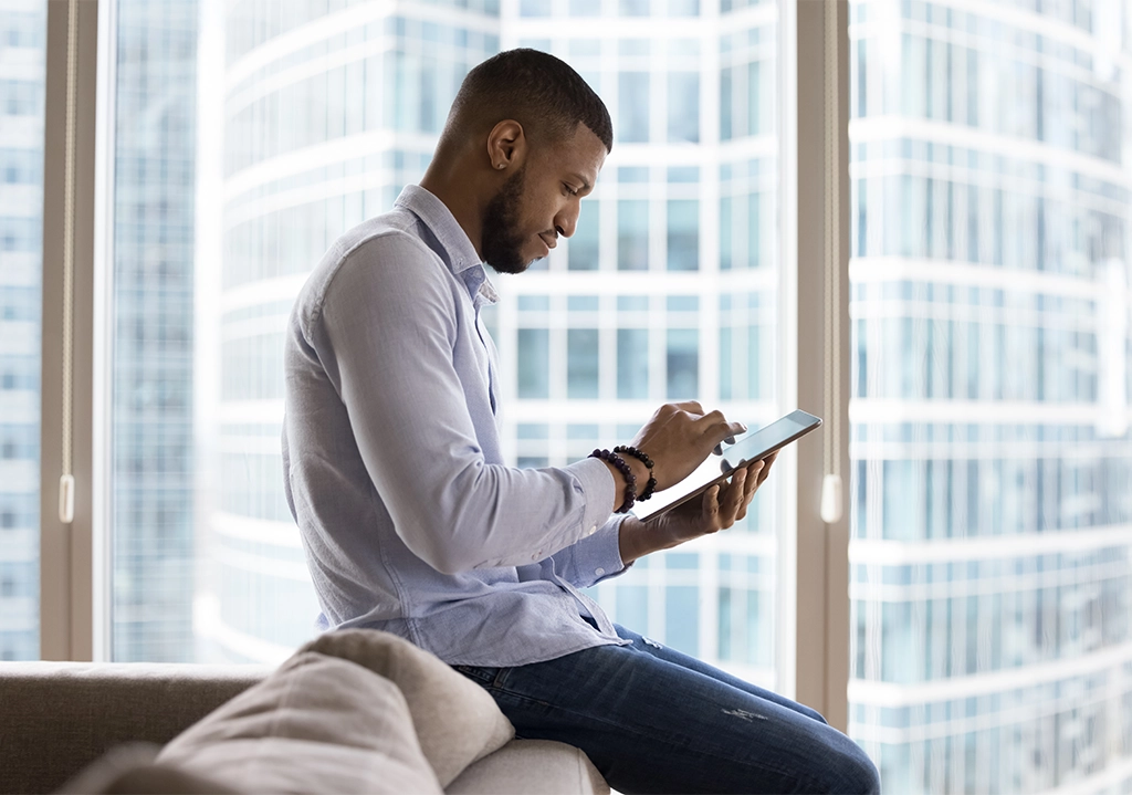 Man working on tablet