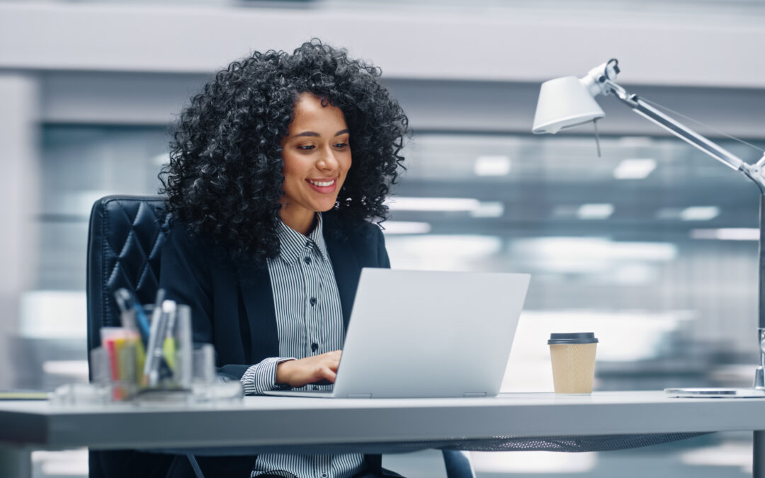 A woman manages her personal and business banking accounts.