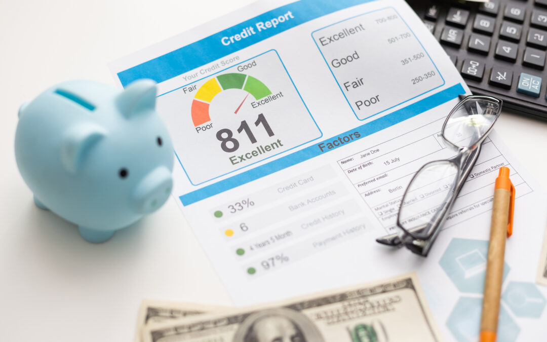 A credit report and analysis on a desk.