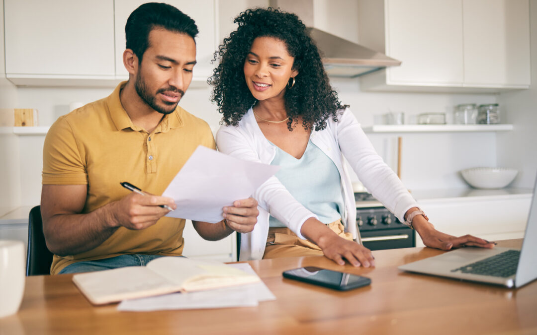 A man and woman learning how to budget.