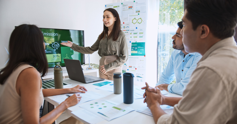 A group of business professionals gathered to discuss energy efficiency.