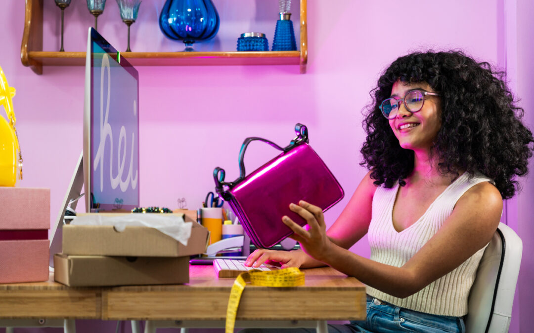 A young woman packs an order for her e-commerce business.